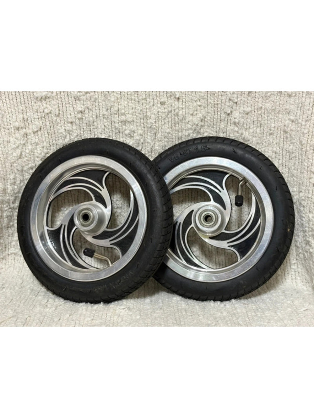 pair of 8-inch aluminum alloy wheels with tires